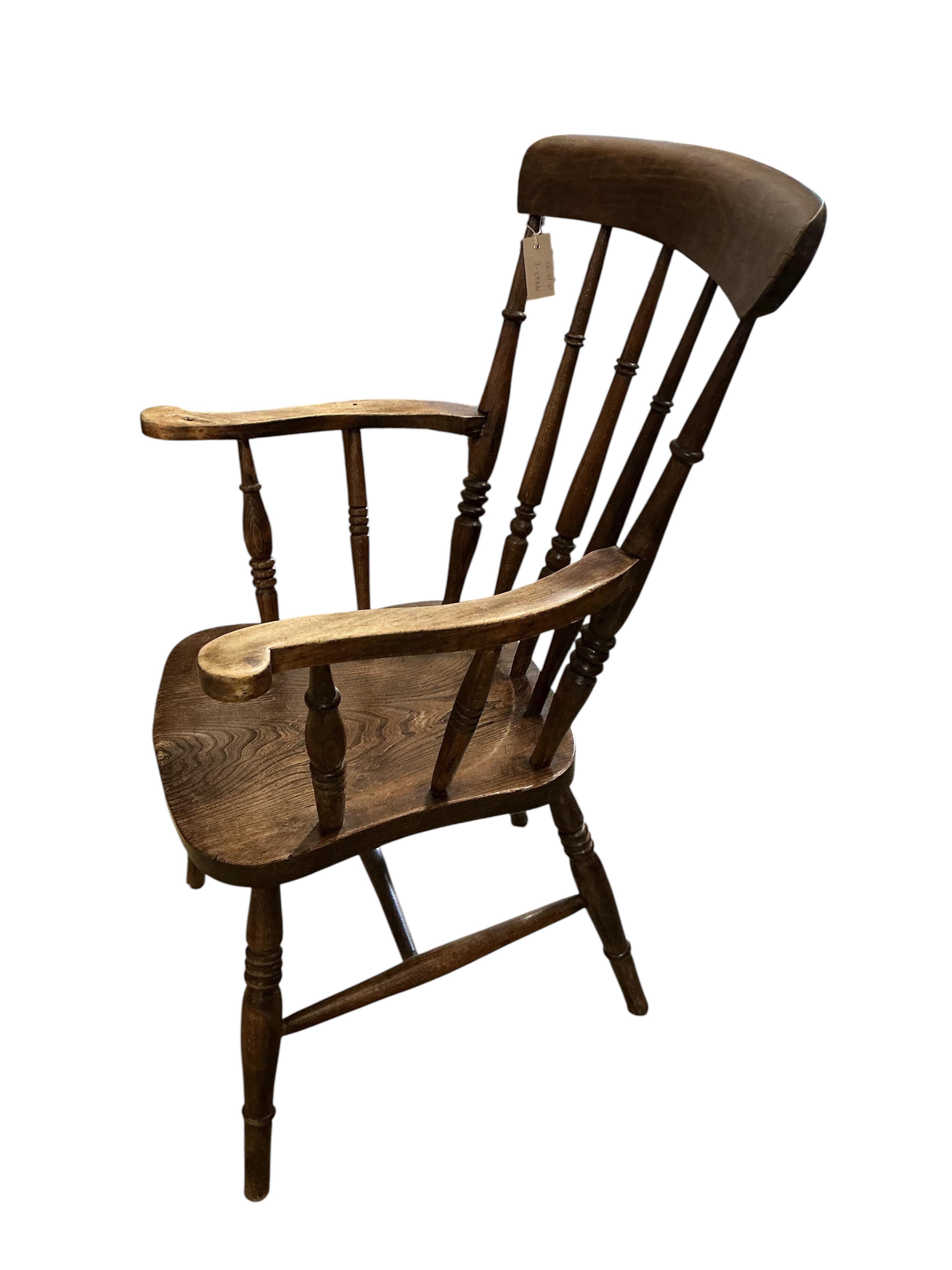 A Victorian elm and beech Windsor armchair, width 59cm, depth 46cm, height 100cm